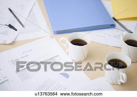 Picture - Messy meeting desk. Fotosearch