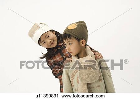 Stock Image - Brother and sister. Fotosearch