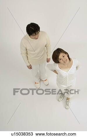 Stock Image - Couple standing. Fotosearch