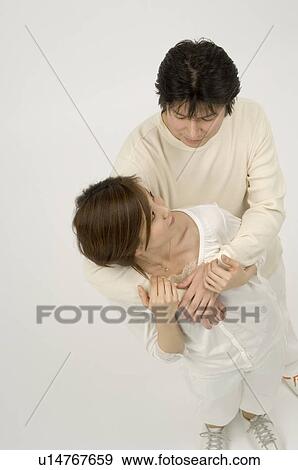 Couple standing View Large Photo Image Stock Photo - Couple standing. Fotosearch