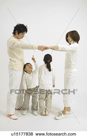 Stock Photo - Family playing. Fotosearch