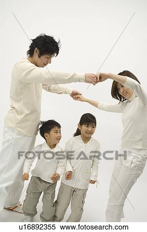 Stock Photography - Family playing. Fotosearch