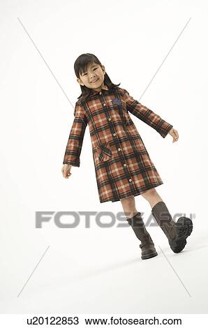 Stock Image - Portrait of girl standing. Fotosearch