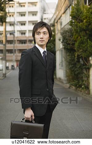 Stock Image - Portrait of businessman. Fotosearch