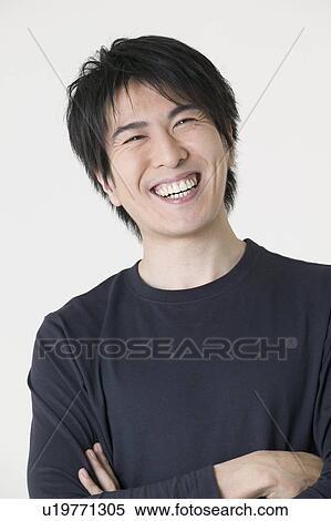 Stock Photography - Portrait of mid adult man. Fotosearch