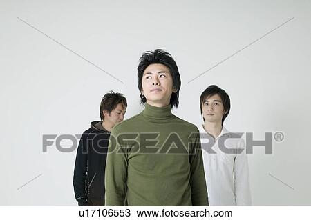 Stock Image - Portrait of three young men. Fotosearch
