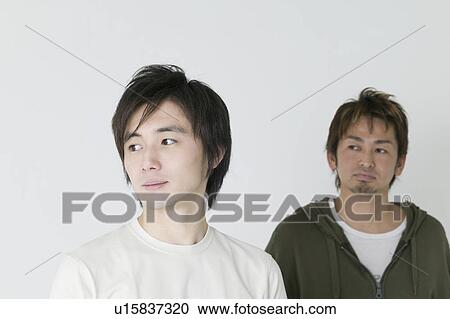 Portrait of two young men View Large Photo Image Stock Image - Portrait of two young men. Fotosearch