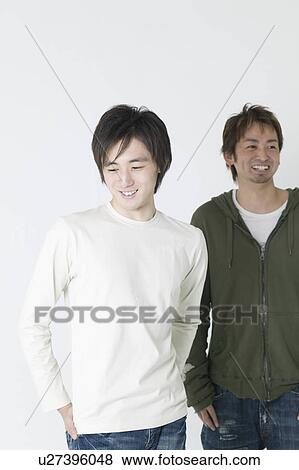 Stock Photo - Portrait of two young men. Fotosearch