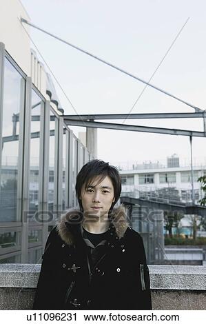 Portrait of young man View Large Photo Image Stock Image - Portrait of young man. Fotosearch