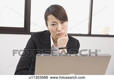 Stock Photo - Stressed young woman. Fotosearch