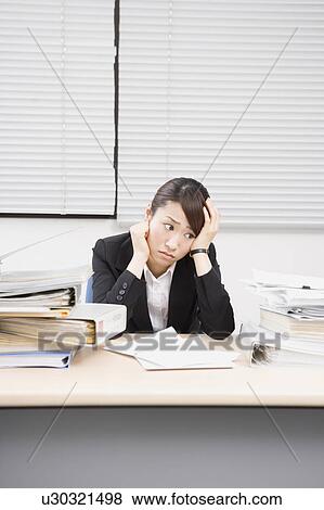 Stressed young woman View Large Photo Image Stock Photo - Stressed young woman. Fotosearch