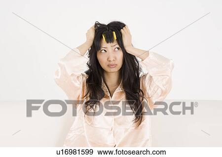 Worried young woman View Large Photo Image Stock Photo - Worried young woman. Fotosearch