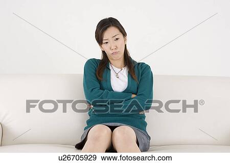 Worried young woman View Large Photo Image Stock Photo - Worried young woman. Fotosearch