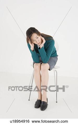 Stock Photograph - Worried young woman. Fotosearch