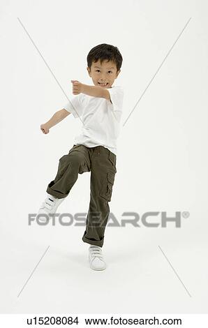 Elementary age boy skipping View Large Photo Image Picture - Elementary age boy skipping. Fotosearch