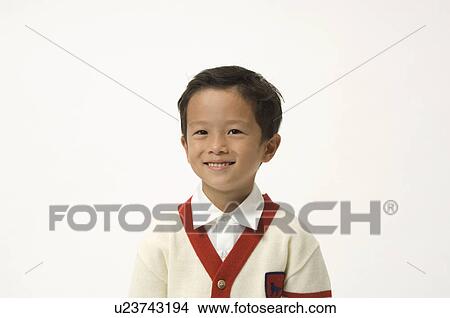 Picture - Elementary age boy smiling. Fotosearch