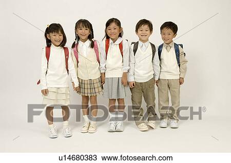 Five elementary age children standing View Large Photo Image Stock Image - Five elementary age children standing. Fotosearch