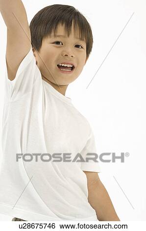 Stock Photograph - Portrait of elementary age boy. Fotosearch