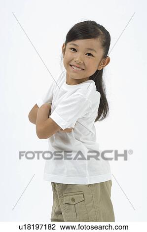 Stock Image - Portrait of elementary age girl. Fotosearch