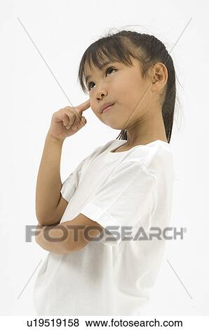 Stock Photo - Portrait of elementary age girl. Fotosearch