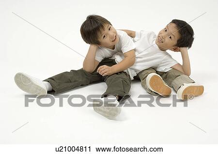 Stock Image - Two elementary age boys. Fotosearch