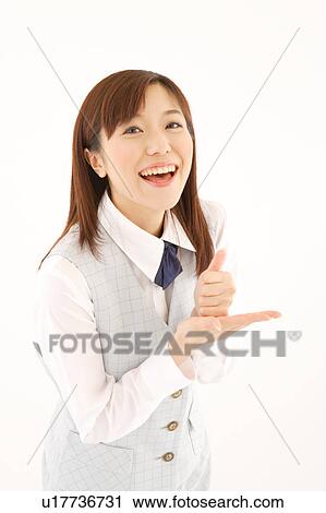 A woman in formal attire having an inspiration View Large Photo Image Stock Image - A woman in formal attire having an inspiration. Fotosearch