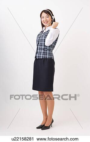A woman with headset posing View Large Photo Image Stock Image - A woman with headset posing. Fotosearch