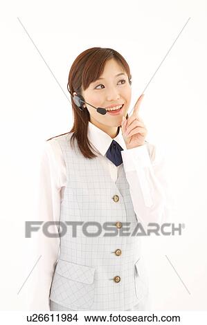 A woman with headset smiling View Large Photo Image Picture - A woman with headset smiling. Fotosearch