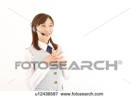 A woman with headset smiling View Large Photo Image Stock Photo - A woman with headset smiling. Fotosearch