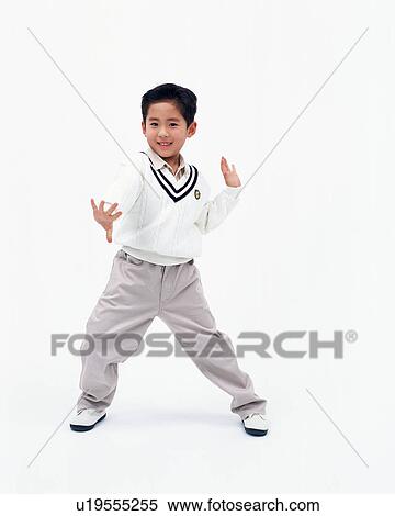 A boy posing to camera View Large Photo Image Stock Photography - A boy posing to camera. Fotosearch