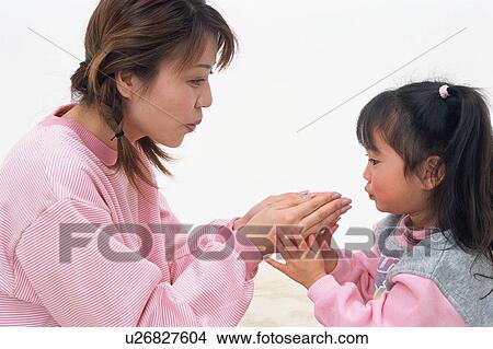 A mother playing with her daughter View Large Photo Image Picture - A mother playing with her daughter. Fotosearch