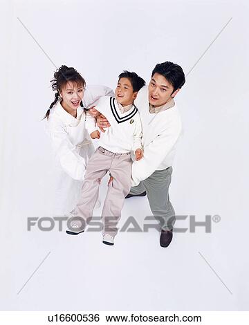 Parents holding their son View Large Photo Image Stock Photograph - Parents holding their son. Fotosearch