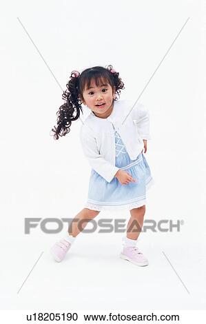 Portrait of a small girl with curly pigtails View Large Photo Image Stock Image - Portrait of a small girl with curly pigtails. Fotosearch