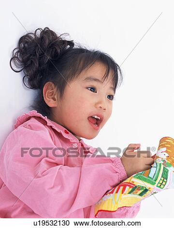 Portrait of a cute girl View Large Photo Image Stock Image - Portrait of a cute girl. Fotosearch