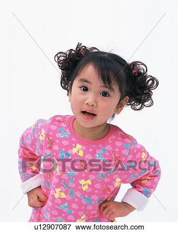 Portrait of a cute girl View Large Photo Image Stock Photo - Portrait of a cute girl. Fotosearch