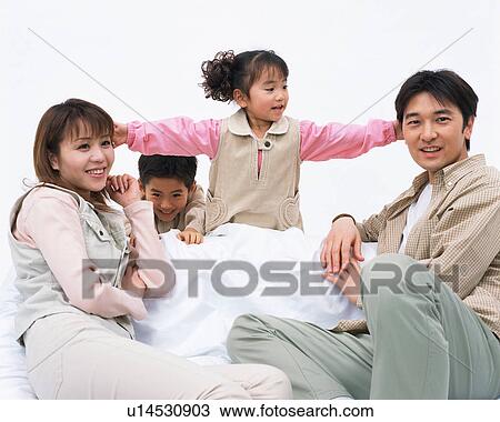 Stock Image - Portrait of a happy family. Fotosearch