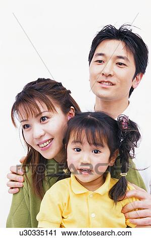Portrait of a happy family View Large Photo Image Stock Image - Portrait of a happy family. Fotosearch