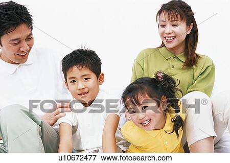 Portrait of a happy family View Large Photo Image Stock Photo - Portrait of a happy family. Fotosearch
