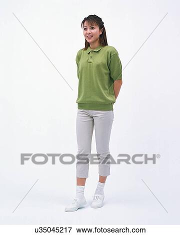Side view of a pretty woman in casual wear View Large Photo Image Stock Photo - Side view of a pretty woman in casual wear. Fotosearch