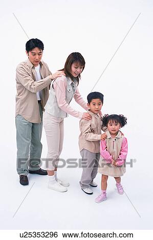 Stock Photograph - Side view of parents and children making up a train. Fotosearch