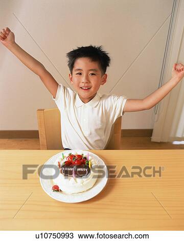 A small boy raising his arms in excitement on his birthday View Large Photo Image Stock Image - A small boy raising his arms in excitement on his birthday. Fotosearch