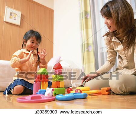 girls playing with toys