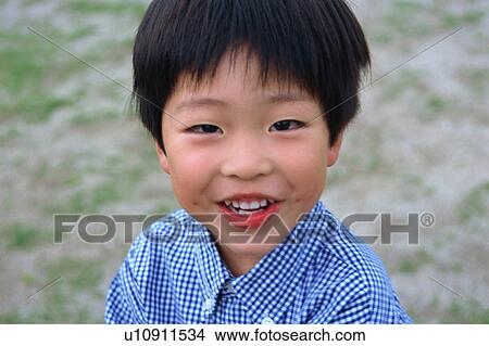 Picture - A boy smiling . Fotosearch