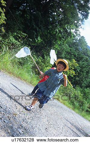 Children running with butterfly net View Large Photo Image Stock Photo - Children running with butterfly net. Fotosearch