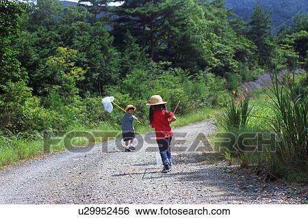 Children walking with butterfly net View Large Photo Image Stock Photograph - Children walking with butterfly net. Fotosearch