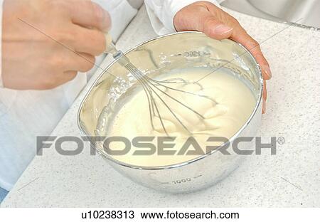 Hands of a woman mixing flour View Large Photo Image Stock Image - Hands of a woman mixing flour. Fotosearch