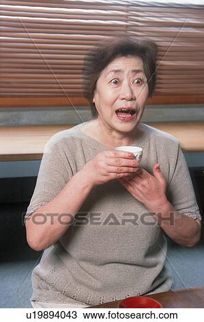 A senior woman look surprised View Large Photo Image Stock Image - A senior woman look surprised. Fotosearch