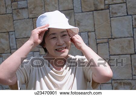 Stock Image - A senior woman smiling. Fotosearch