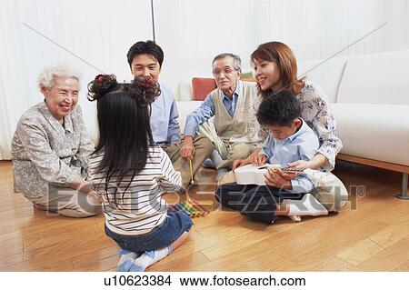Picture - Family playing with instruments. Fotosearch