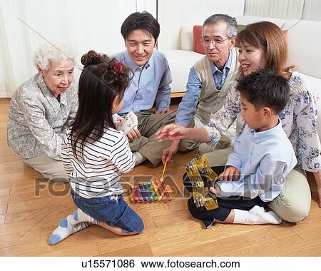 Family playing with instruments View Large Photo Image Stock Photograph - Family playing with instruments. Fotosearch